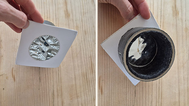 Zwei Detailaufnahmen eines selbstgebauten Sonnenfilters zur Beobachtung einer totalen Sonnenfinsternis. Eine mit reflektierender Filterfolie bespannte Papphalterung wird vor ein schwarzes, röhrenförmiges Bauteil gesetzt. Im Hintergrund ist eine helle Holzoberfläche zu sehen.